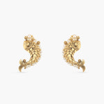 A picture of a pair Indian artificial earrings in fish patterns with pearls.