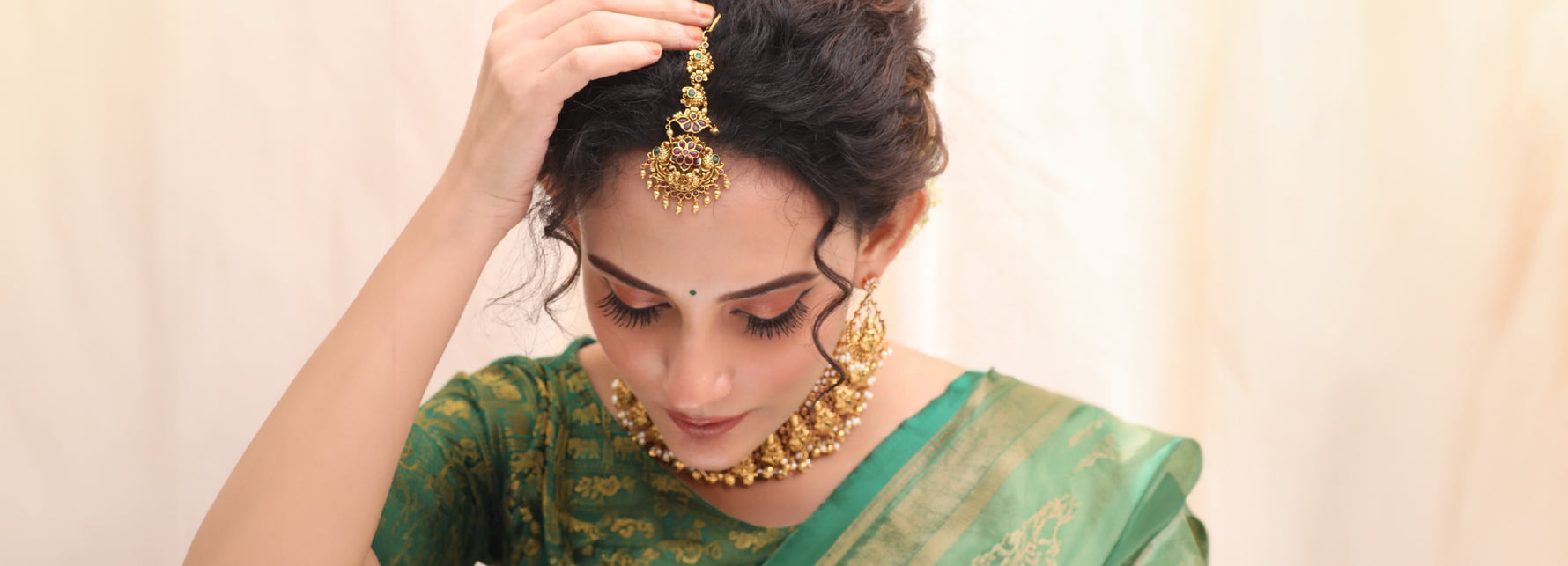 From Braids to Buns: Maang Tikka Styles for All Hair Types