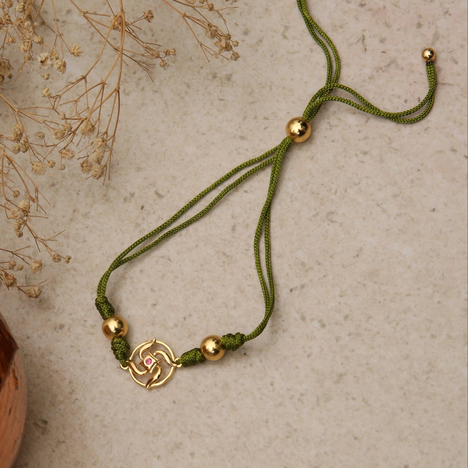 Swastik Shakti Gold Plated Silver Rakhi