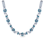 A picture of a rhodium plated necklace with aqua stones and Cubic Zirconia in a floral design.