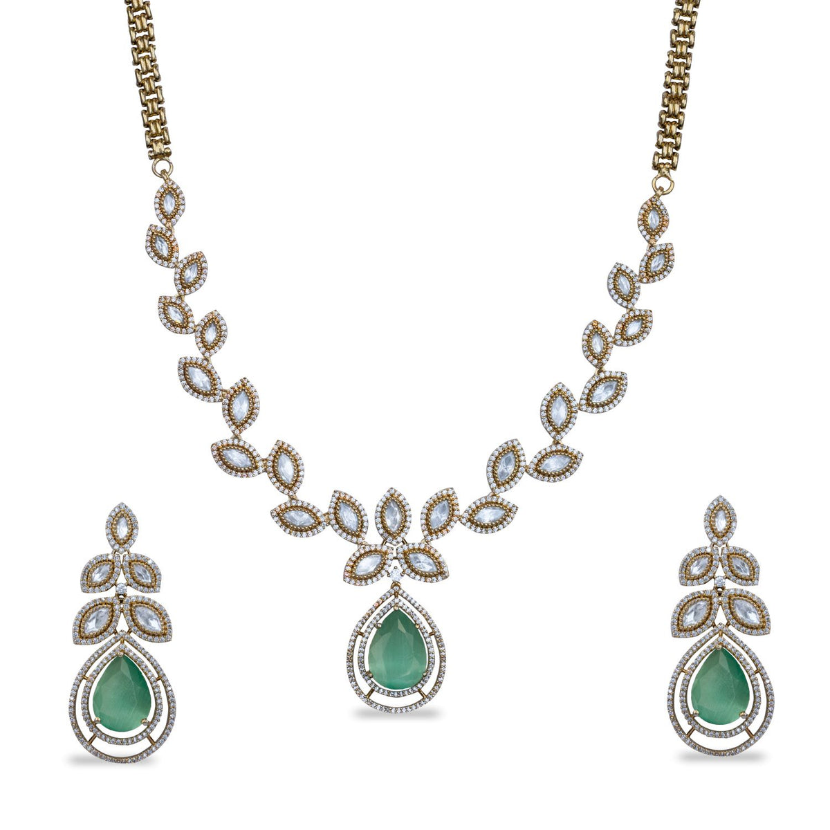 Close-up photo of a rose petal necklace and earring set with green and white gemstone. 