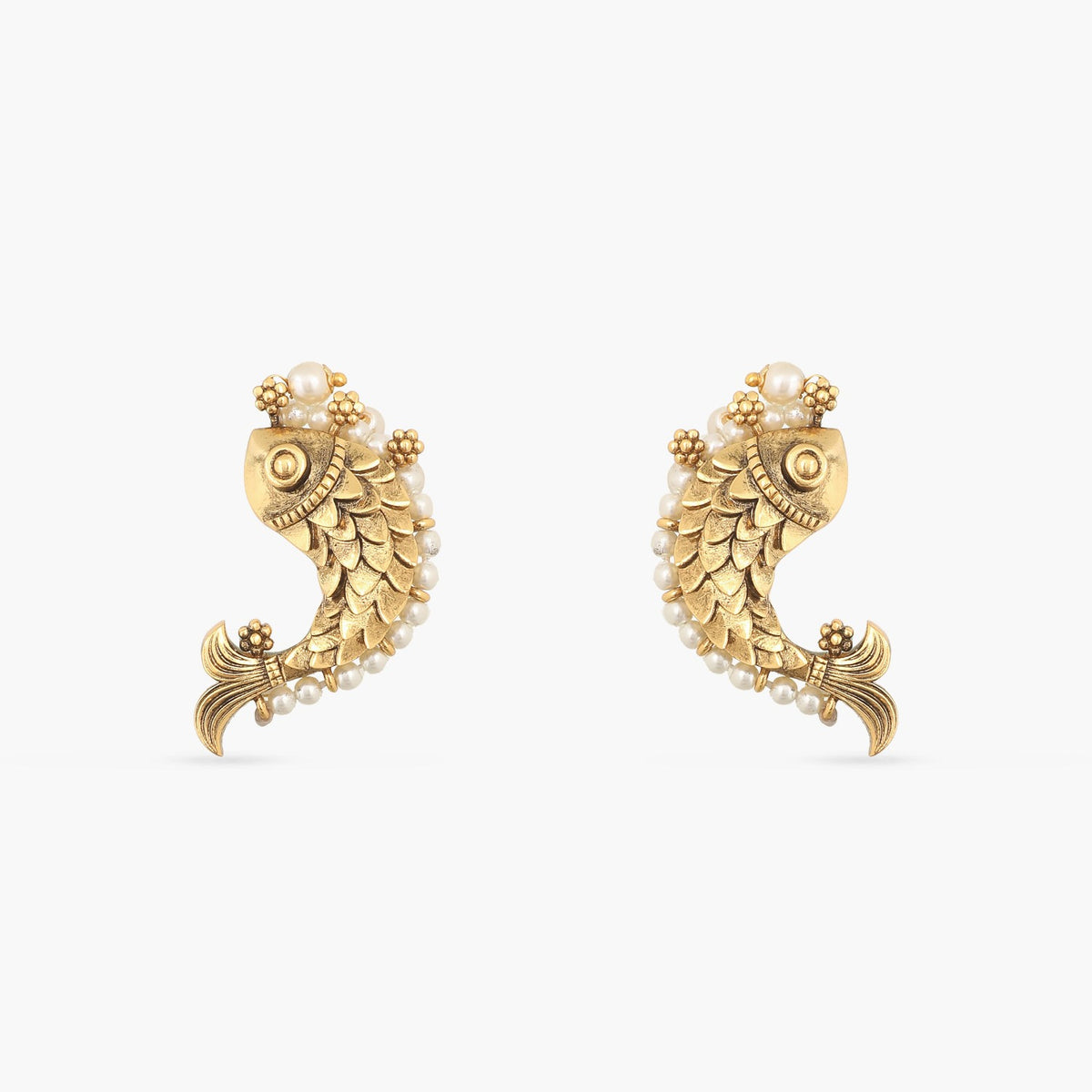 A picture of a pair Indian artificial earrings in fish patterns with pearls.